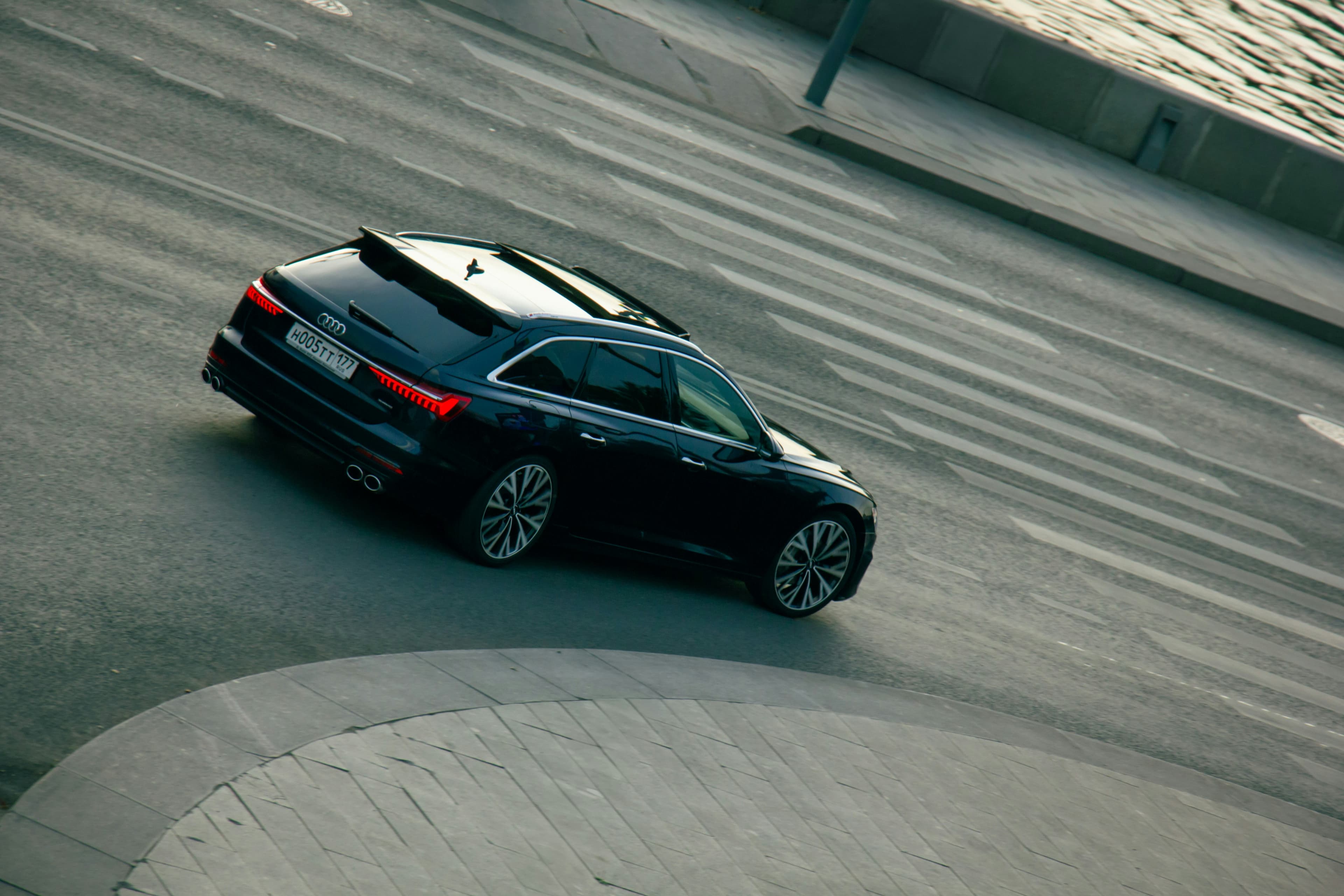 A MOTIVE Motor Co. vehicle in motion, aerial view