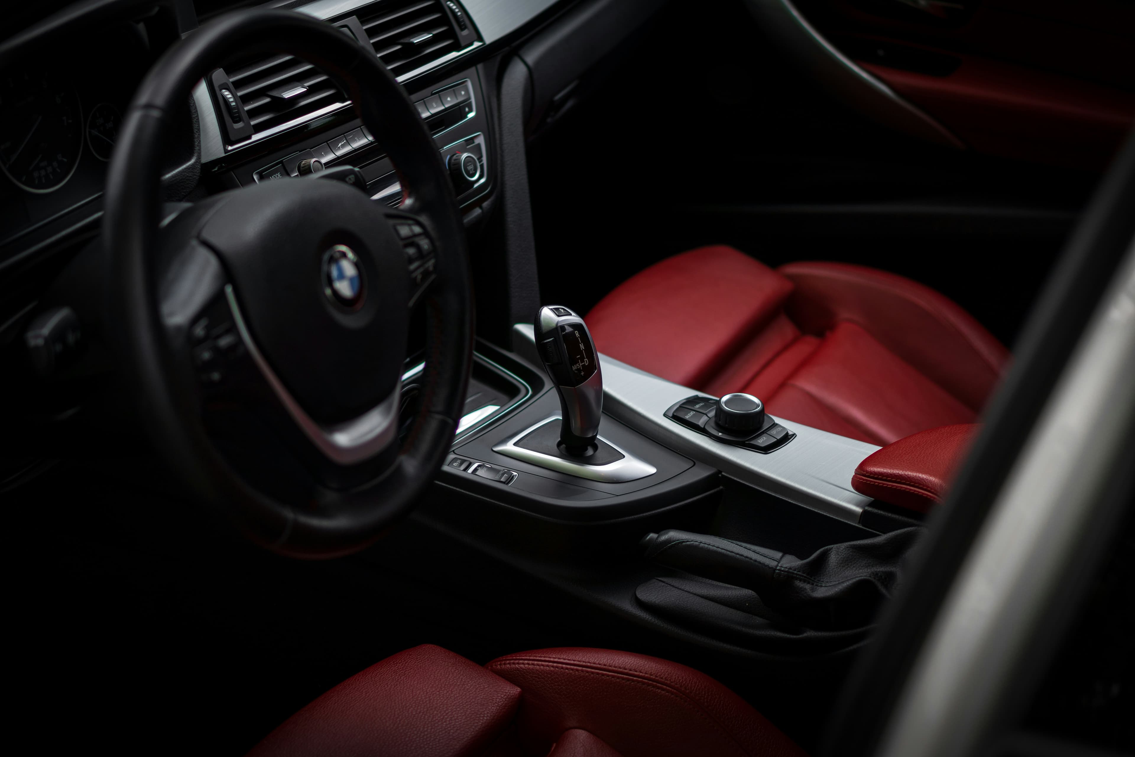Interior detail — stitched leather and switchgear